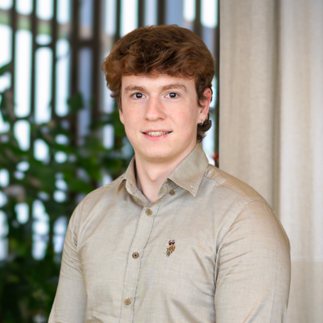 a man smiling at camera