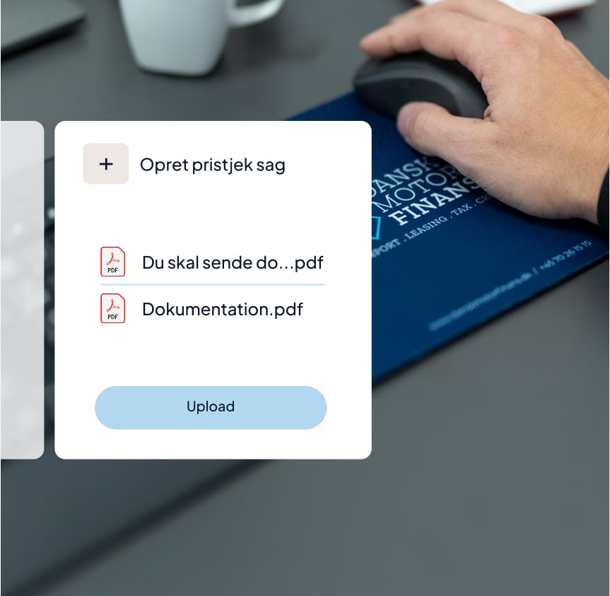 a hand holding a mouse