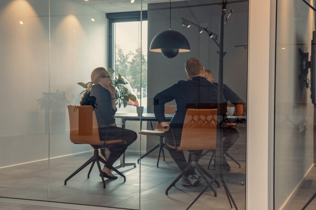 a group of people sitting at a table